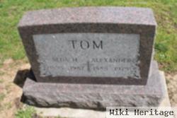 Alda M Tom