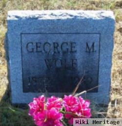 George M Wolf