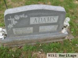 Milburn J. Adams