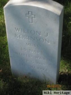 Wilton J Robinson