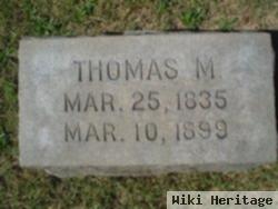 Thomas M Tucker