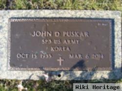 John D Puskar
