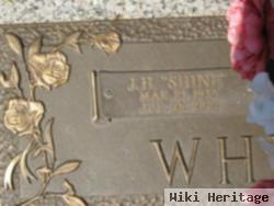 J. H. "shine" Whitaker