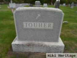 John B Touher