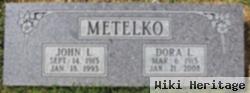 John L Metelko