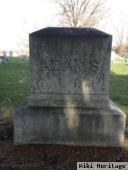 Earl E Adams