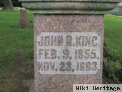 John R King