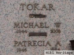 Michael W Tokar