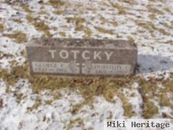 George E. Totcky