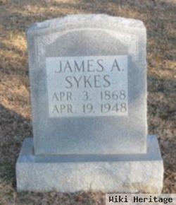 James A. Sykes