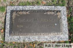 Thomas M Flenner