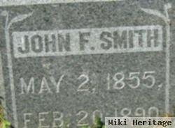 John F Smith