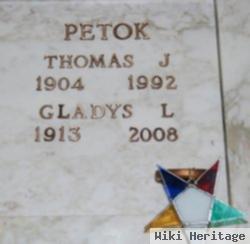 Thomas J Petok