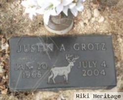 Justin A Grotz