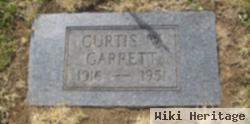 Curtis W Garrett