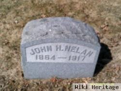 John H Nelan