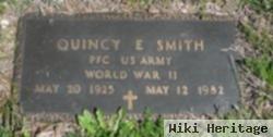 Quincy E Smith