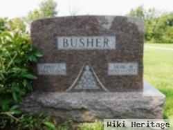 John E. Busher