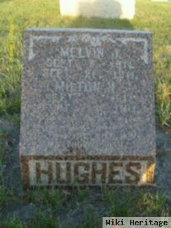 Melvin J Hughes