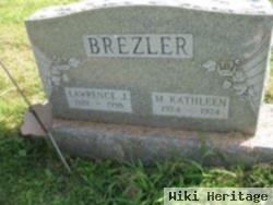 Lawrence J Brezler