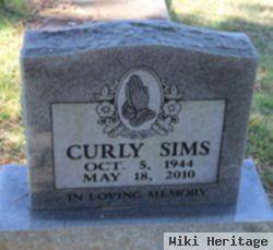 Curly Sims