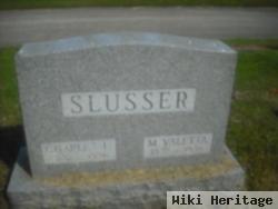 Charles L Slusser