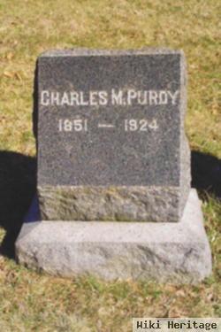 Charles M Purdy