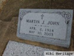 Martin J John