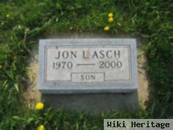 Jon L Asch