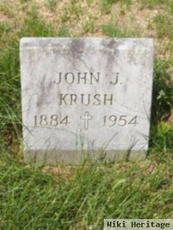 John J Krush