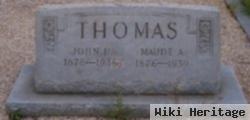 John D Thomas