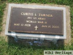 Curtis L Turner