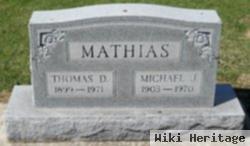 Michael J Mathias