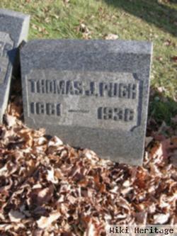 Thomas J Pugh