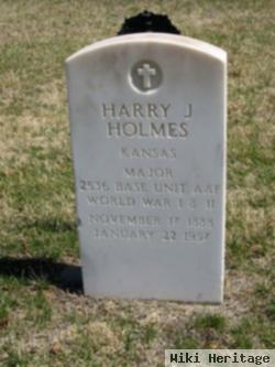 Harry J Holmes