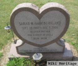 Sarah M Burkland