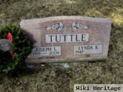 Joseph L Tuttle