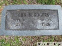 John M Rogers