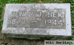 Henry J Riek