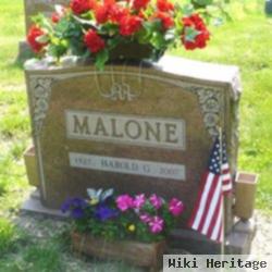 Harold G Malone