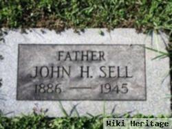 John H Sell