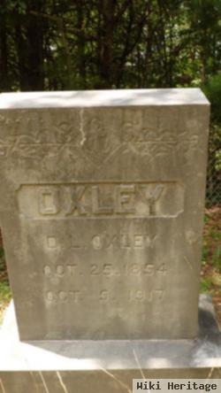 D. L. Oxley