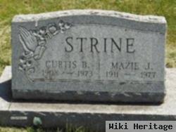 Curtis B Strine