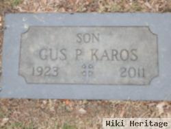 Gus P Karos