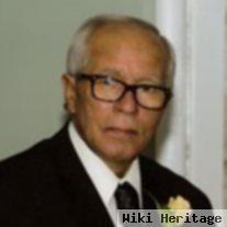 Hector L Vazquez