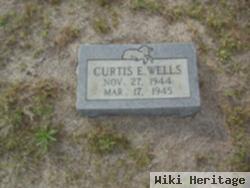 Curtis E Wells