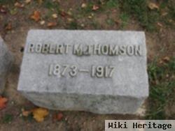 Robert M Thomson