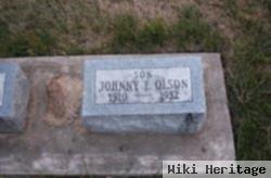 Johnny E Olson