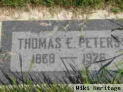 Thomas E Peters