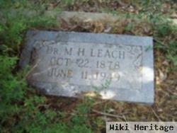 Dr M H Leach